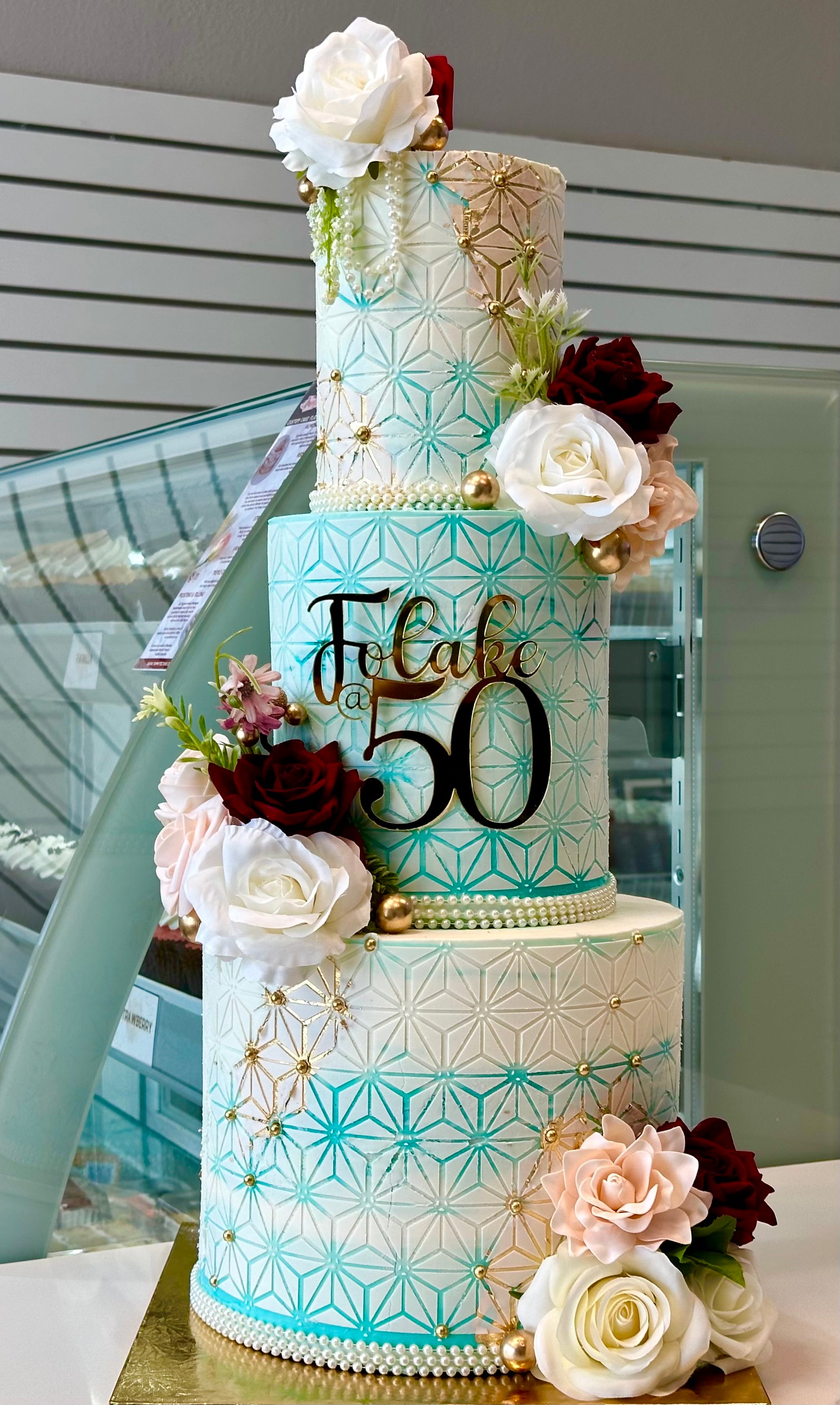 Three-tiered stencil cake